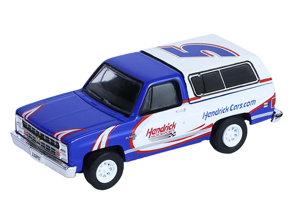 1986 Chevrolet K5 Blazer Blue and White and 1969 Chevrolet Camaro #5 Blue and White "Kyle Larson - Hendrick Motorsports" with Tandem Car Trailer "Racing Hitch & Tow" Series 6 1/64 Diecast Model Cars by Greenlight